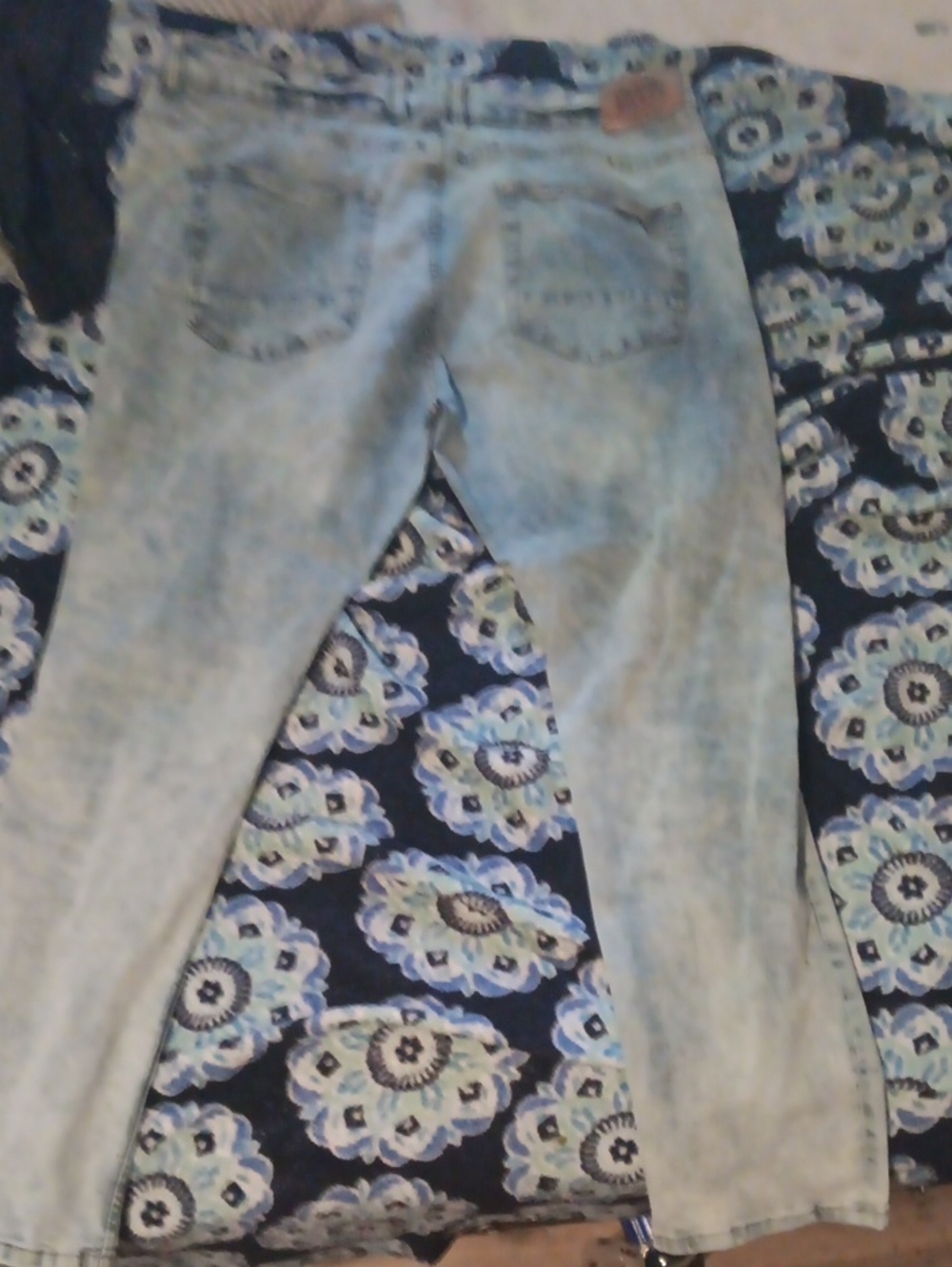 Distressed Denim Rivets with Slight Acid-Wash and Riveted Back Pockets.